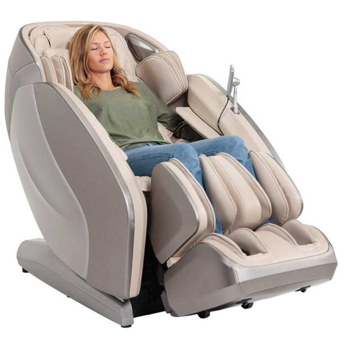 Kyota Hatsumei M900AI 4D Massage Chair in Gray/Tan with woman sitting.