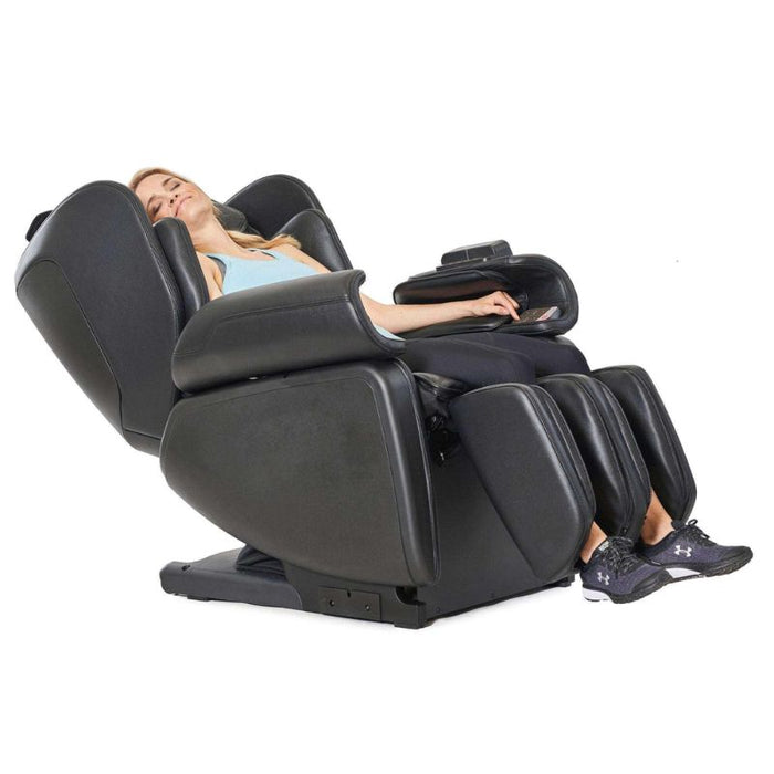 Synca Kurodo E - Premium Commercial Massage Chair with woman relaxing in the chair.