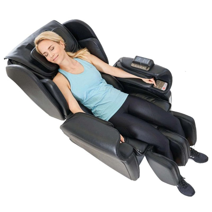 Synca Kurodo E - Premium Commercial Massage Chair with woman sitting in the chair.