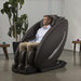 Inner Balance Wellness Ji Massage Chair IMR0047 in brown color semi side view with person in room