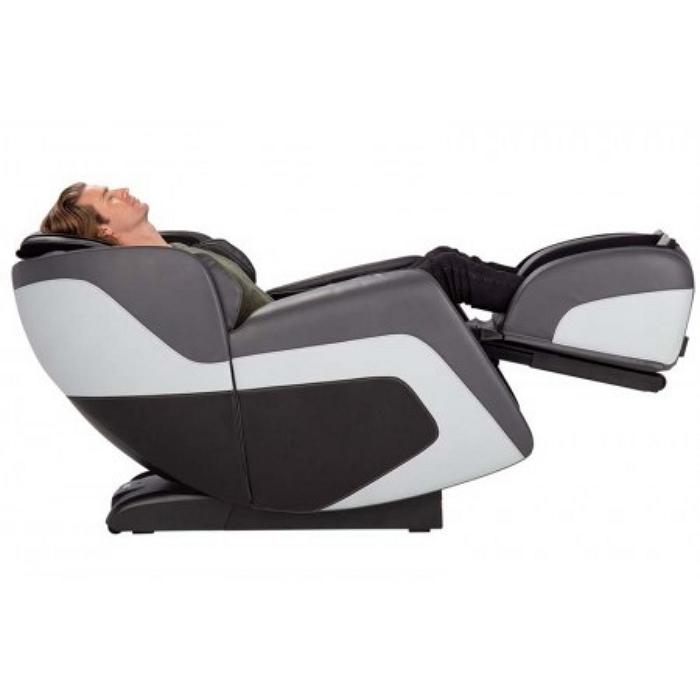 Human Touch Sana Massage Chair fully reclined with person