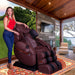 Luraco i9 Max Plus Special Edition Medical Massage Chair in Chocolate Brown color with woman standing beside it.