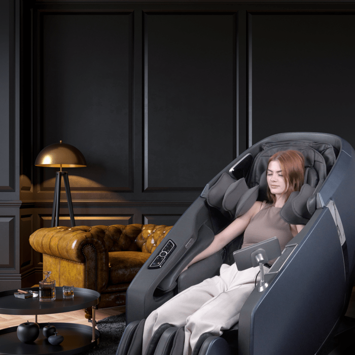 Person sitting in the Osaki Highpoint massage chair in a home.