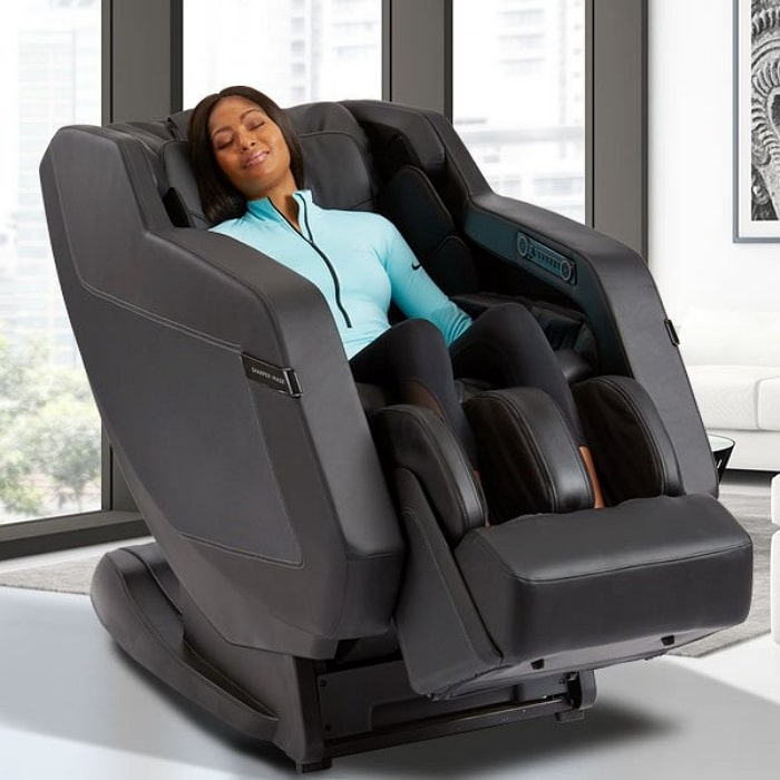 Sharper Image Relieve 3D Massage Chair with Woman Relaxing in the Chair